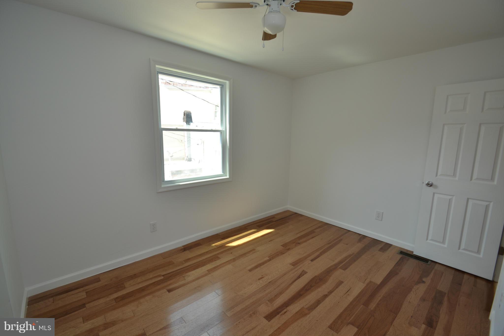 3301 Toone Street, Unit A Baltimore, MD 21224 - Photo 17 of 22 Back Bedroom