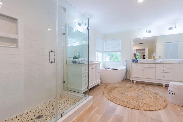 a room with a sink and a mirror