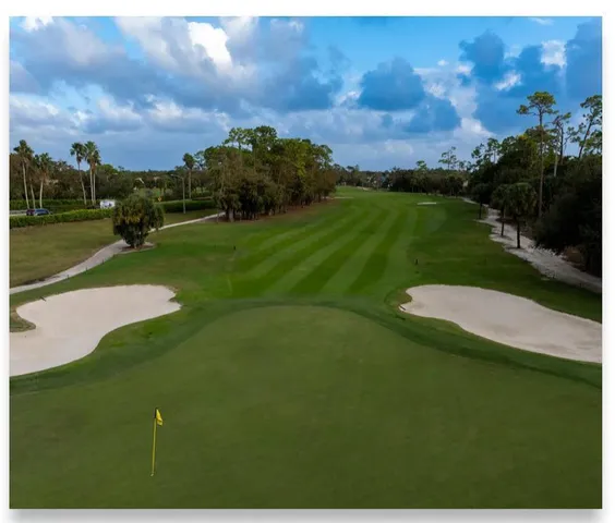 a view of a golf course with a garden