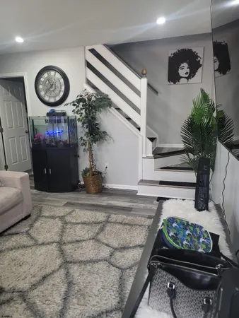 a view of a entryway door with furniture