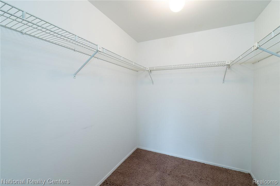 2272 London Bridge Drive, Unit 52 Rochester, MI 48307 - Photo 15 of 24 Master Bedroom closet - huge!