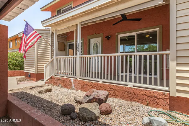 a backyard of a house with wooden fence