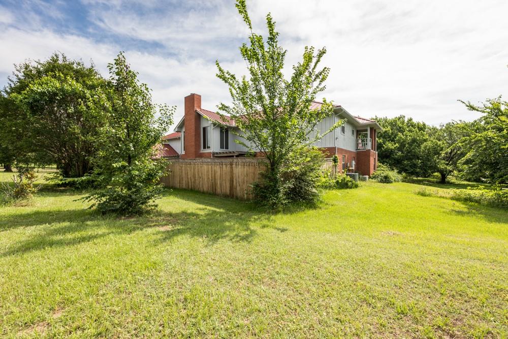 9554 David Fort Road Argyle, TX 76226 - Photo 5 of 35 a front view of a house with yard and swimming pool