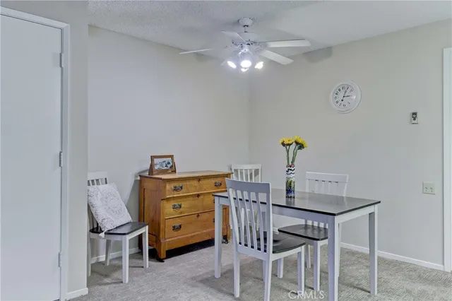 a view of a workspace with furniture