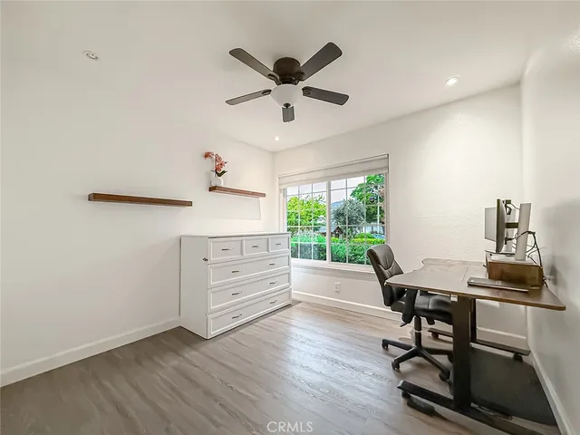 a workspace with furniture and a window