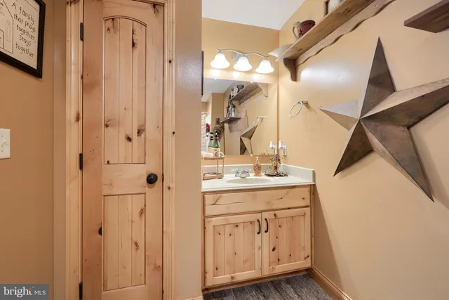 a room with furniture and a flat screen tv