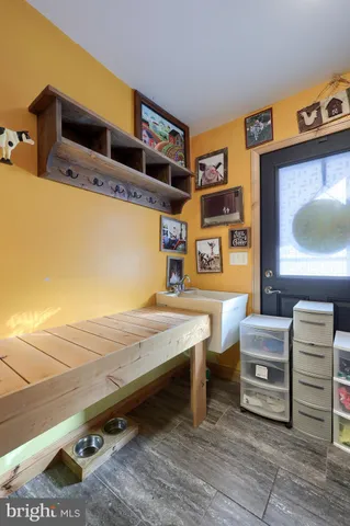 a bed room with furniture and wooden floor