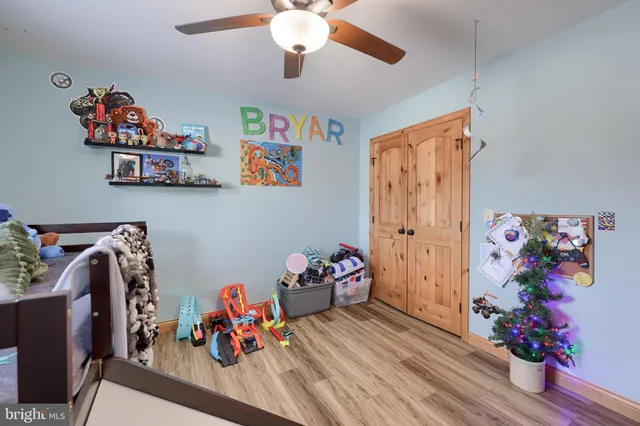 a bedroom with furniture and a bed