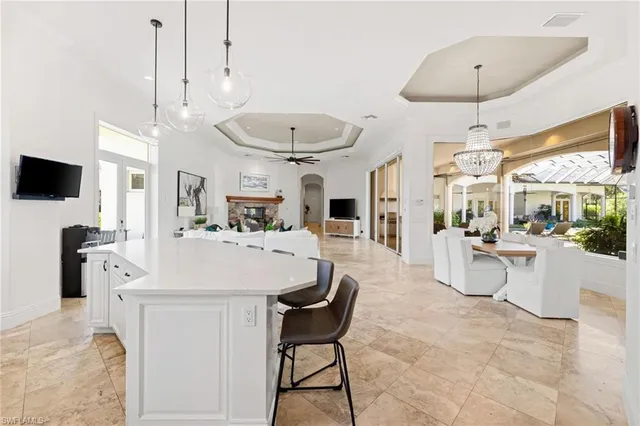 an aerial view of residential houses with outdoor space and street view