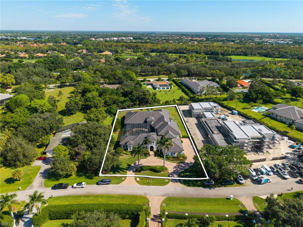 185 Tupelo Road Naples, FL 34108 - Photo 43 of 44 an aerial view of residential houses with outdoor space and street view