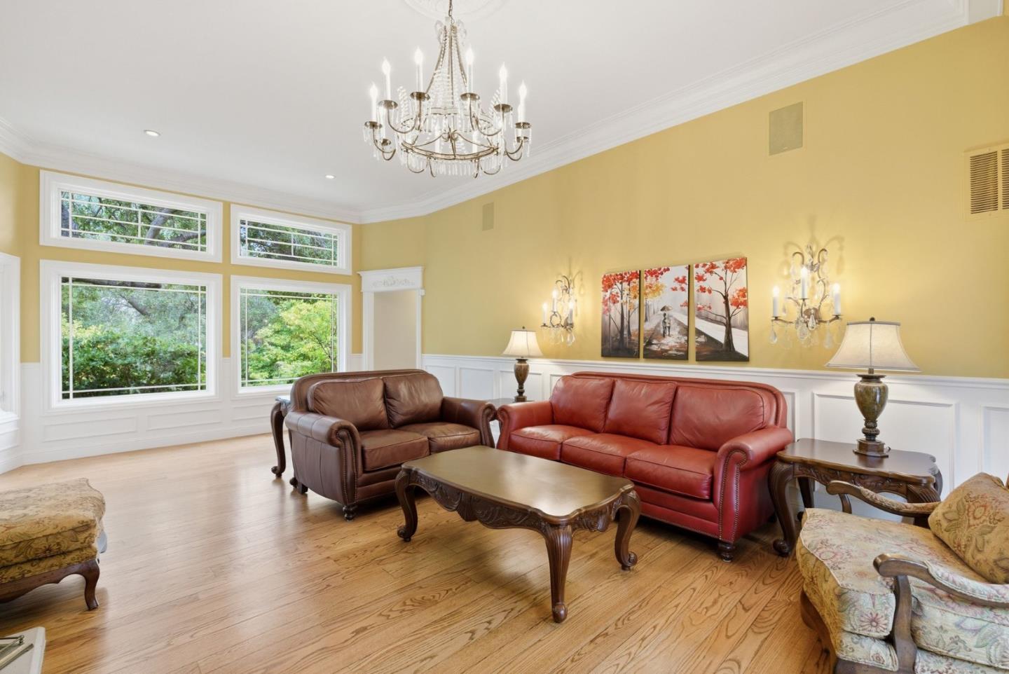 23423 Toyonita Road Los Altos Hills, CA 94024 - Photo 16 of 59 a living room with furniture and a chandelier