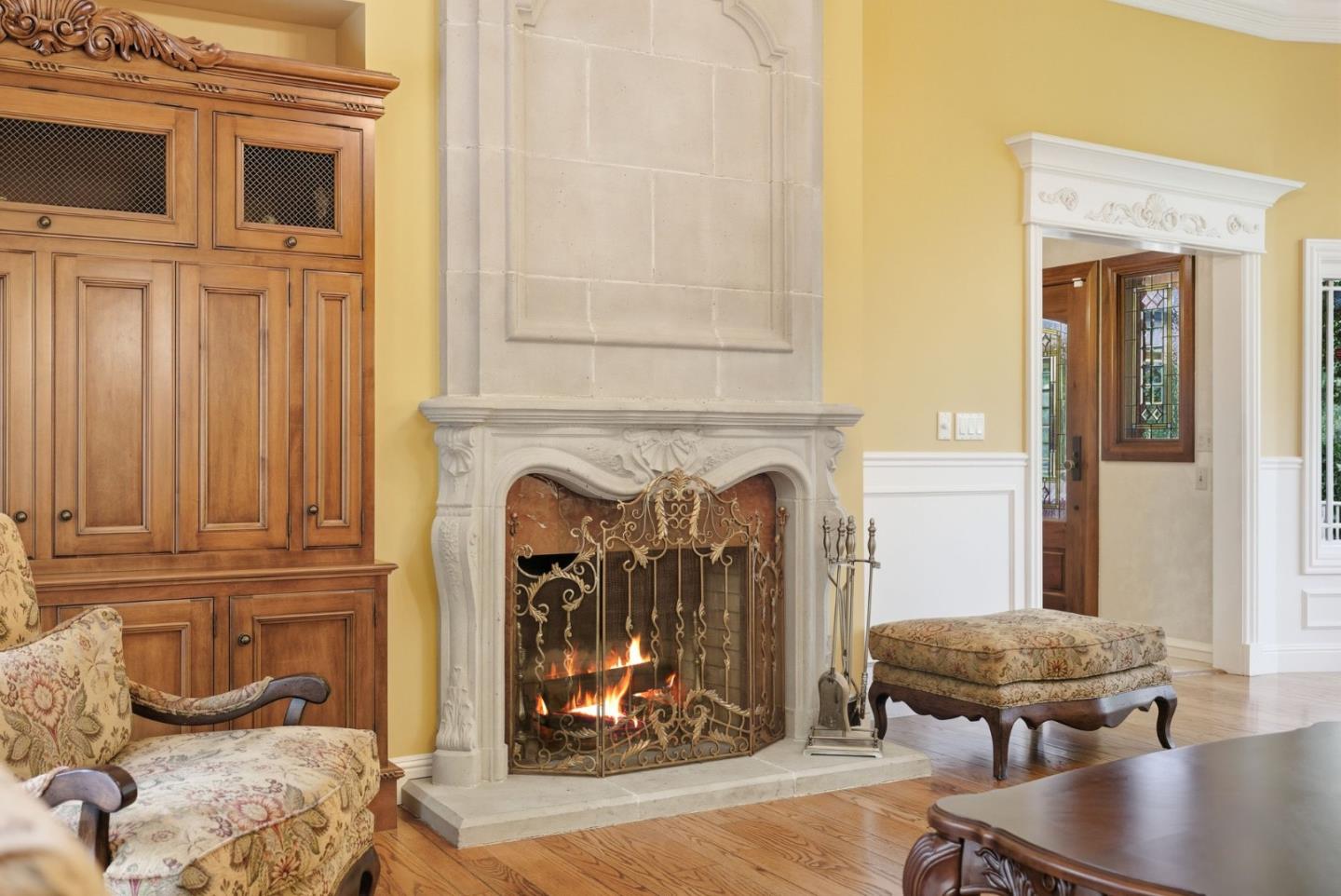 23423 Toyonita Road Los Altos Hills, CA 94024 - Photo 18 of 59 a living room with furniture and a fireplace