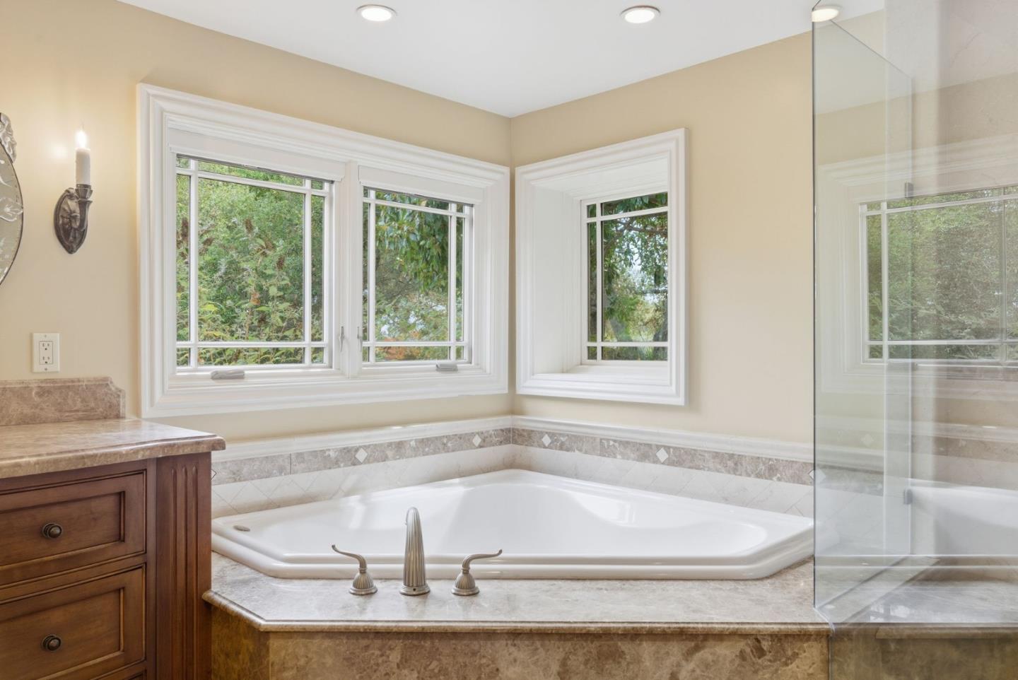 23423 Toyonita Road Los Altos Hills, CA 94024 - Photo 25 of 59 a bathroom with a granite countertop sink and bathtub