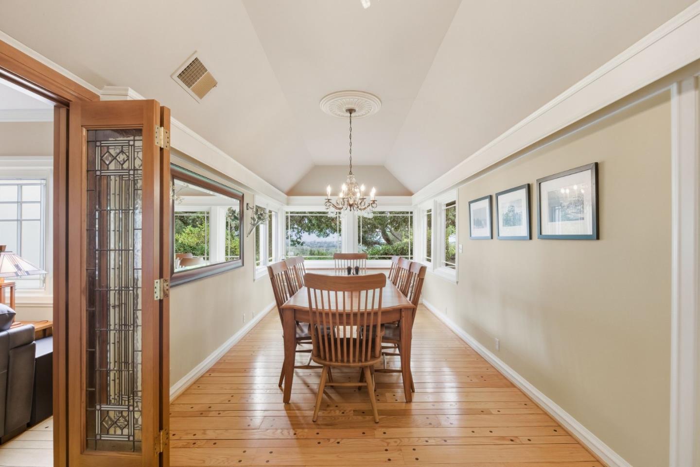 23423 Toyonita Road Los Altos Hills, CA 94024 - Photo 28 of 59 a view of a dining room with furniture window and wooden floor