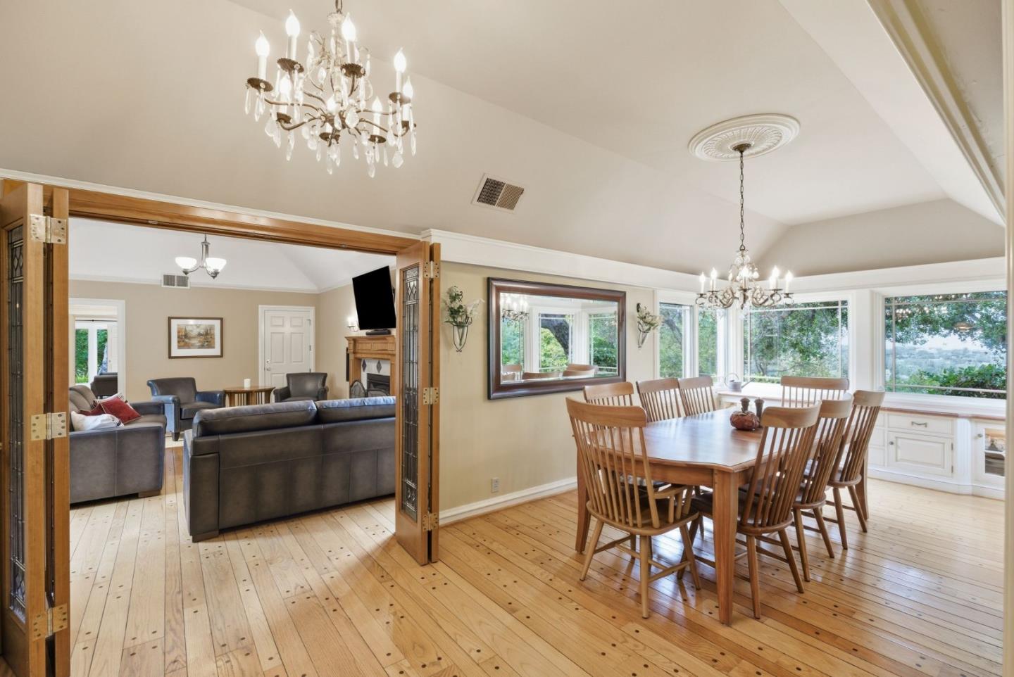 23423 Toyonita Road Los Altos Hills, CA 94024 - Photo 29 of 59 a view of a dining room with furniture window and wooden floor