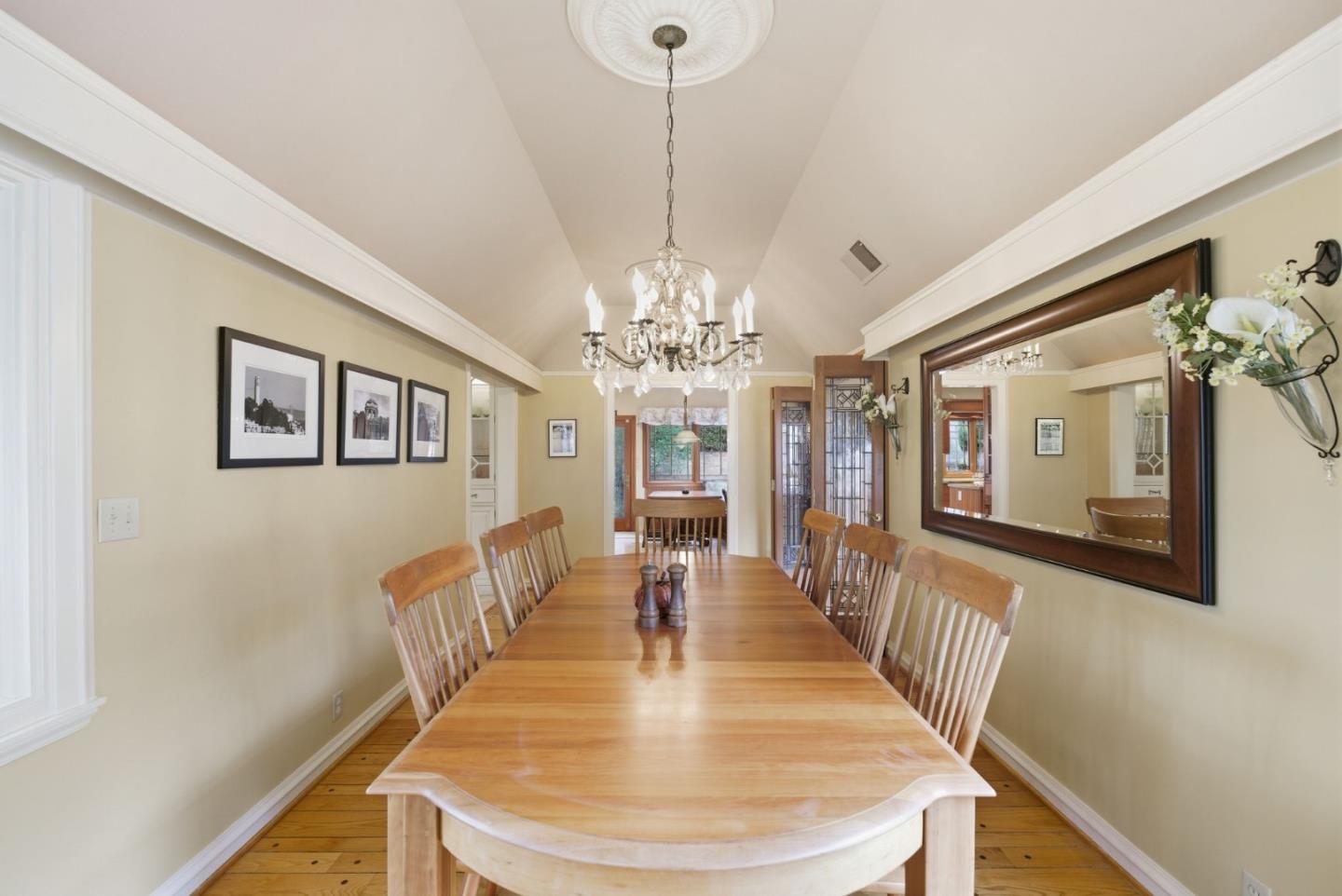 23423 Toyonita Road Los Altos Hills, CA 94024 - Photo 31 of 59 a view of a dining room with furniture a chandelier and wooden floor