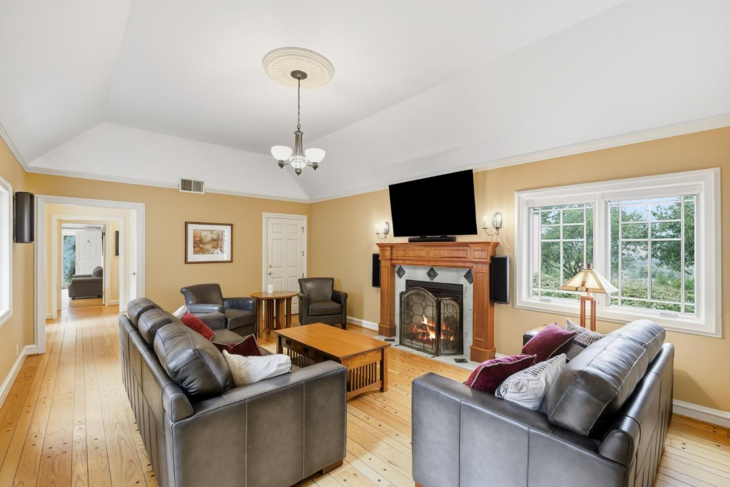 23423 Toyonita Road Los Altos Hills, CA 94024 - Photo 35 of 59 a living room with fireplace furniture and a flat screen tv