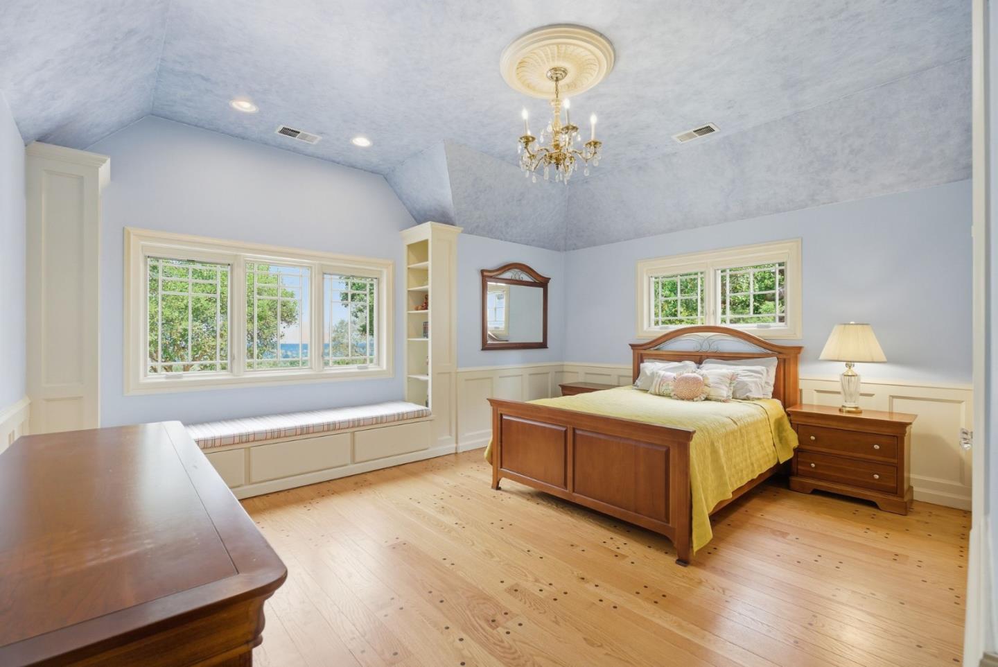 23423 Toyonita Road Los Altos Hills, CA 94024 - Photo 43 of 59 a spacious bedroom with a bed and window