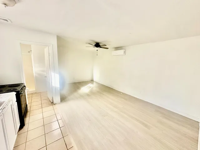 a view of a livingroom with wooden floor