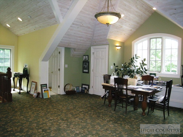 500 Manor Ridge Boone, NC 28607 - Photo 16 of 17 a view of a dining room with furniture and a chandelier