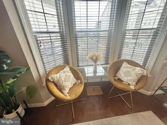 a view of a living room and dining room