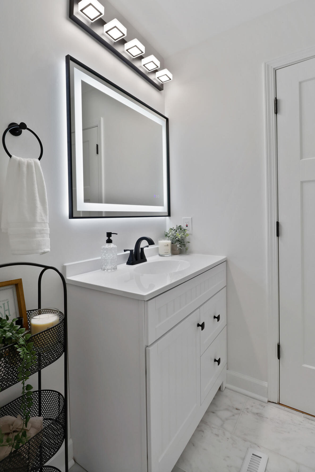 1564 Clinton Street Gary, IN 46406 - Photo 18 of 27 a bathroom with a sink vanity and mirror