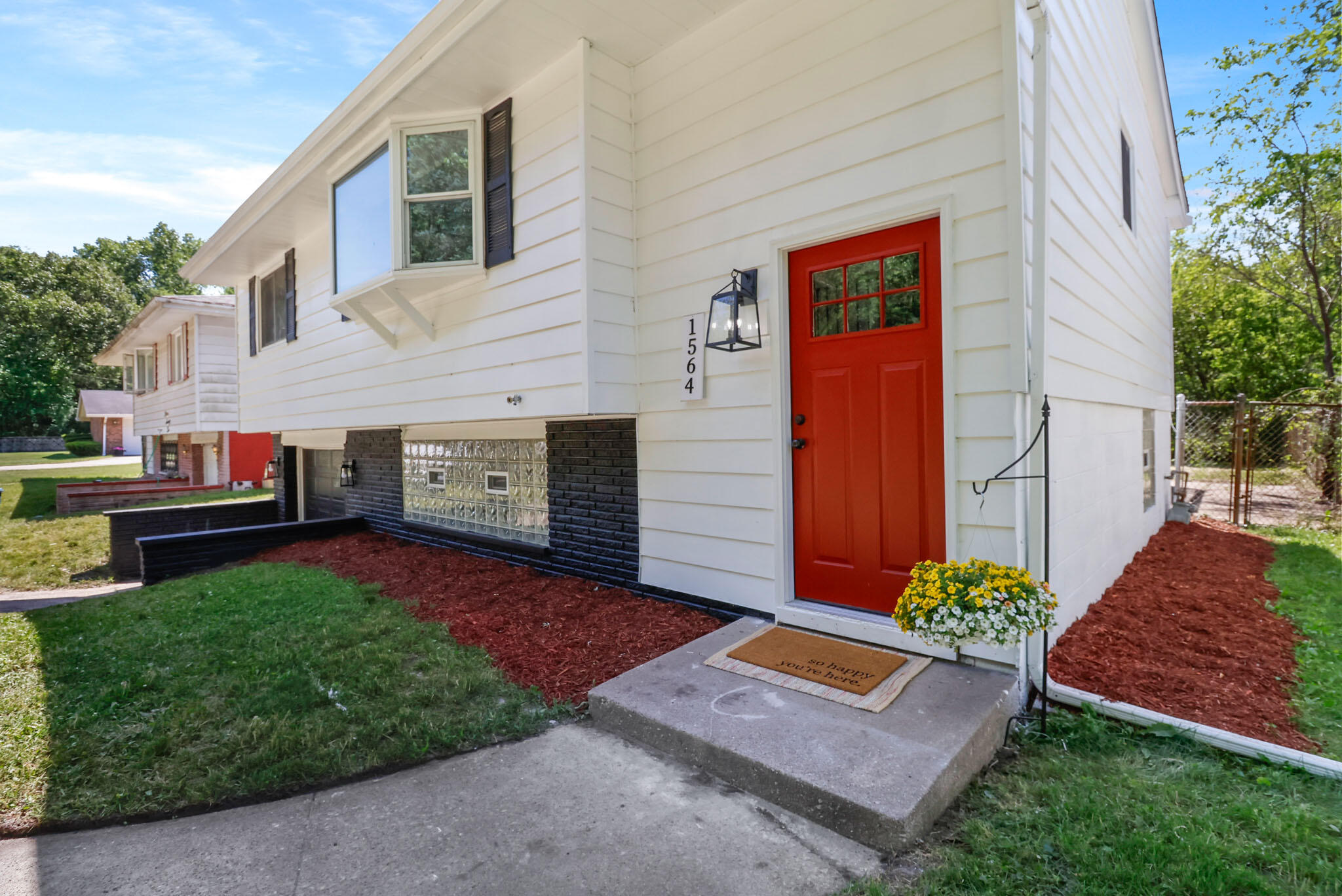 1564 Clinton Street Gary, IN 46406 - Photo 3 of 27 a view of a yard in front of house