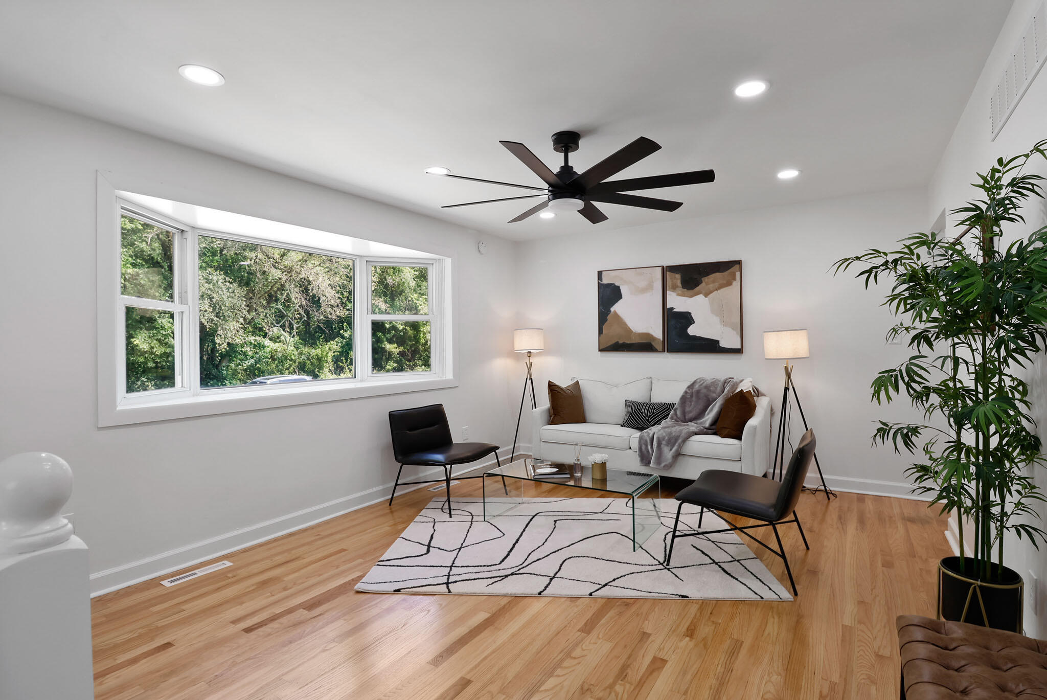 1564 Clinton Street Gary, IN 46406 - Photo 4 of 27 a living room with furniture and a large window