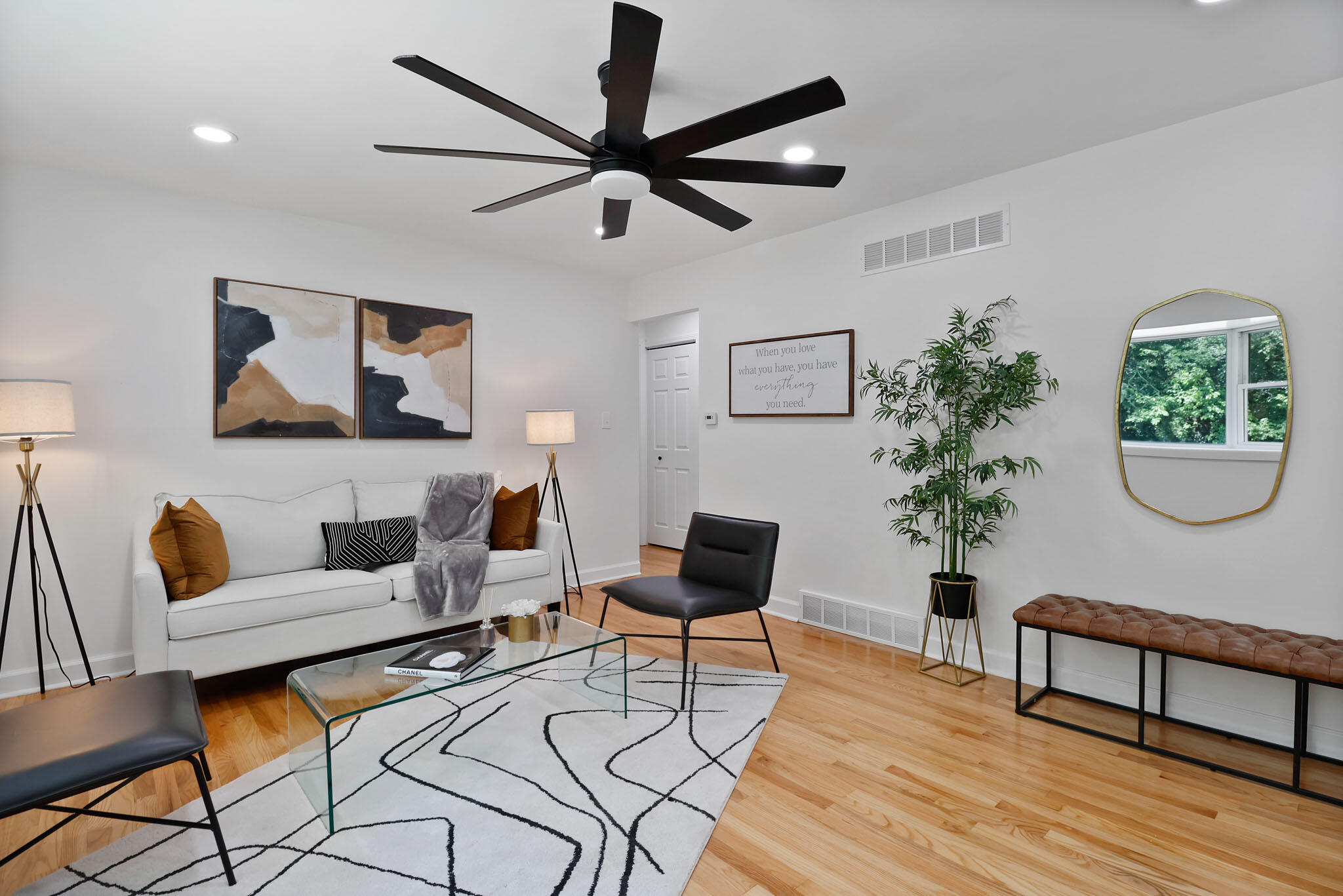 1564 Clinton Street Gary, IN 46406 - Photo 5 of 27 a living room with furniture and a potted plant