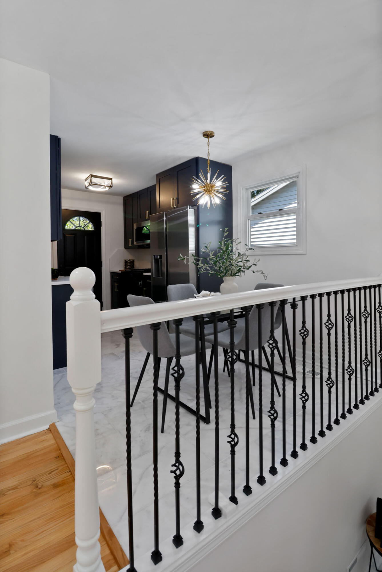 1564 Clinton Street Gary, IN 46406 - Photo 8 of 27 a view of entryway and hall with wooden floor