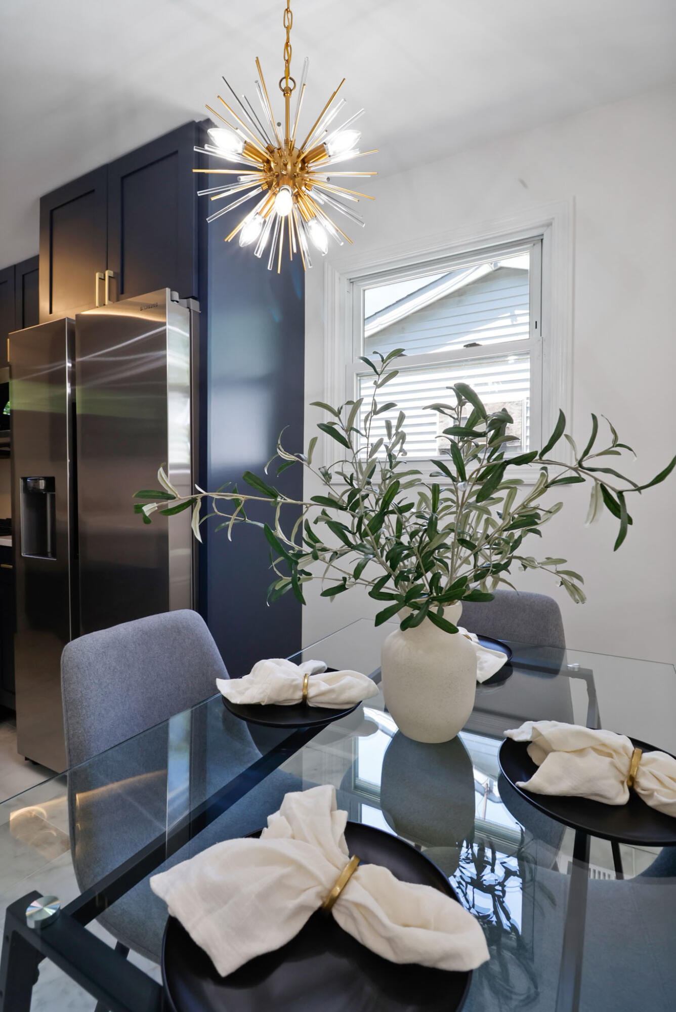 1564 Clinton Street Gary, IN 46406 - Photo 9 of 27 a living room with furniture and a chandelier
