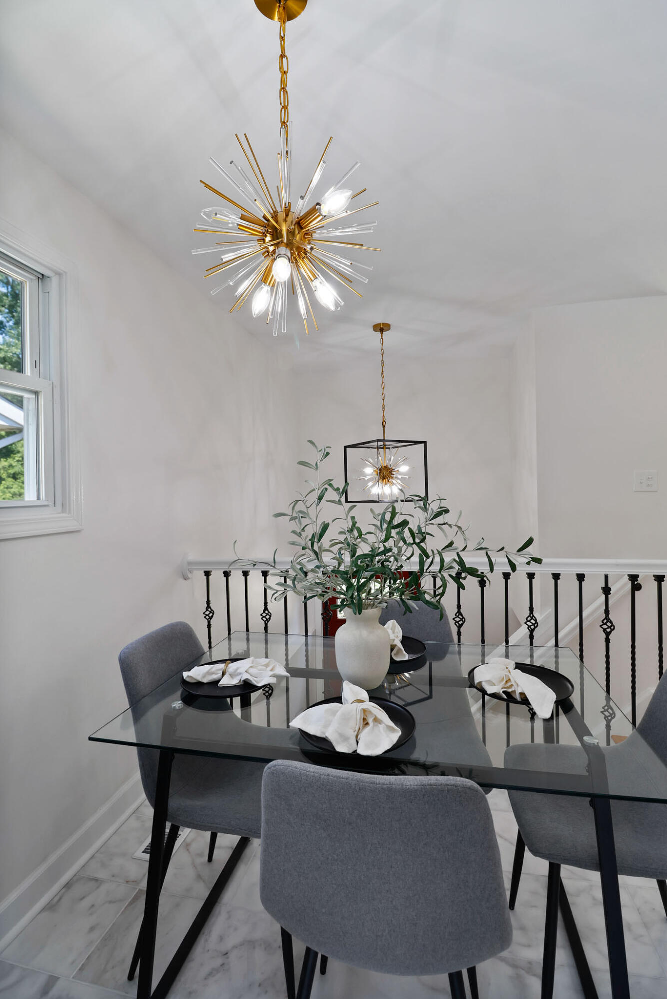 1564 Clinton Street Gary, IN 46406 - Photo 10 of 27 a view of a dining room with furniture a chandelier and wooden floor
