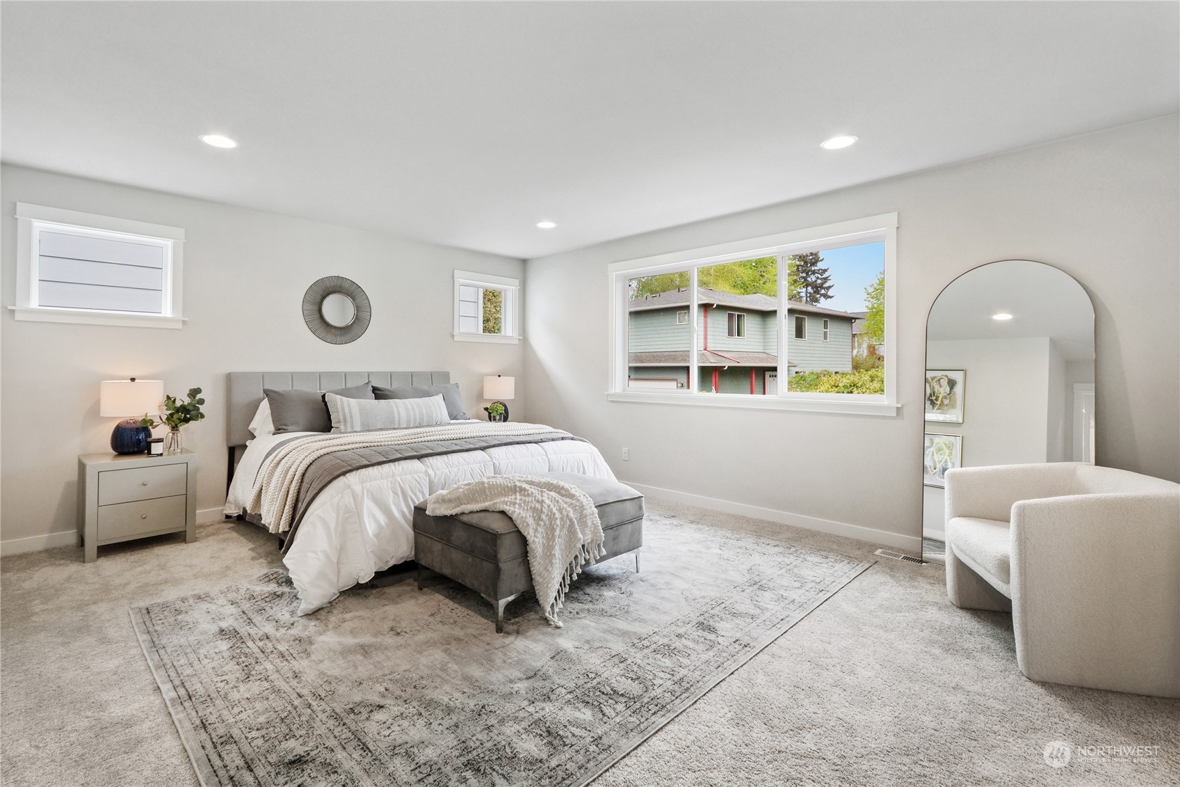 3904 211th Place Southeast Bothell, WA 98021 - Photo 17 of 24 a bed room with a bed mirror and a window