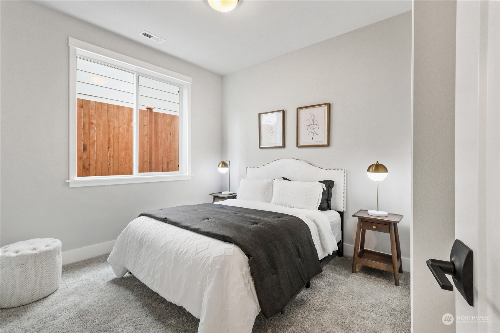 3904 211th Place Southeast Bothell, WA 98021 - Photo 22 of 24 a bedroom with a bed and a window
