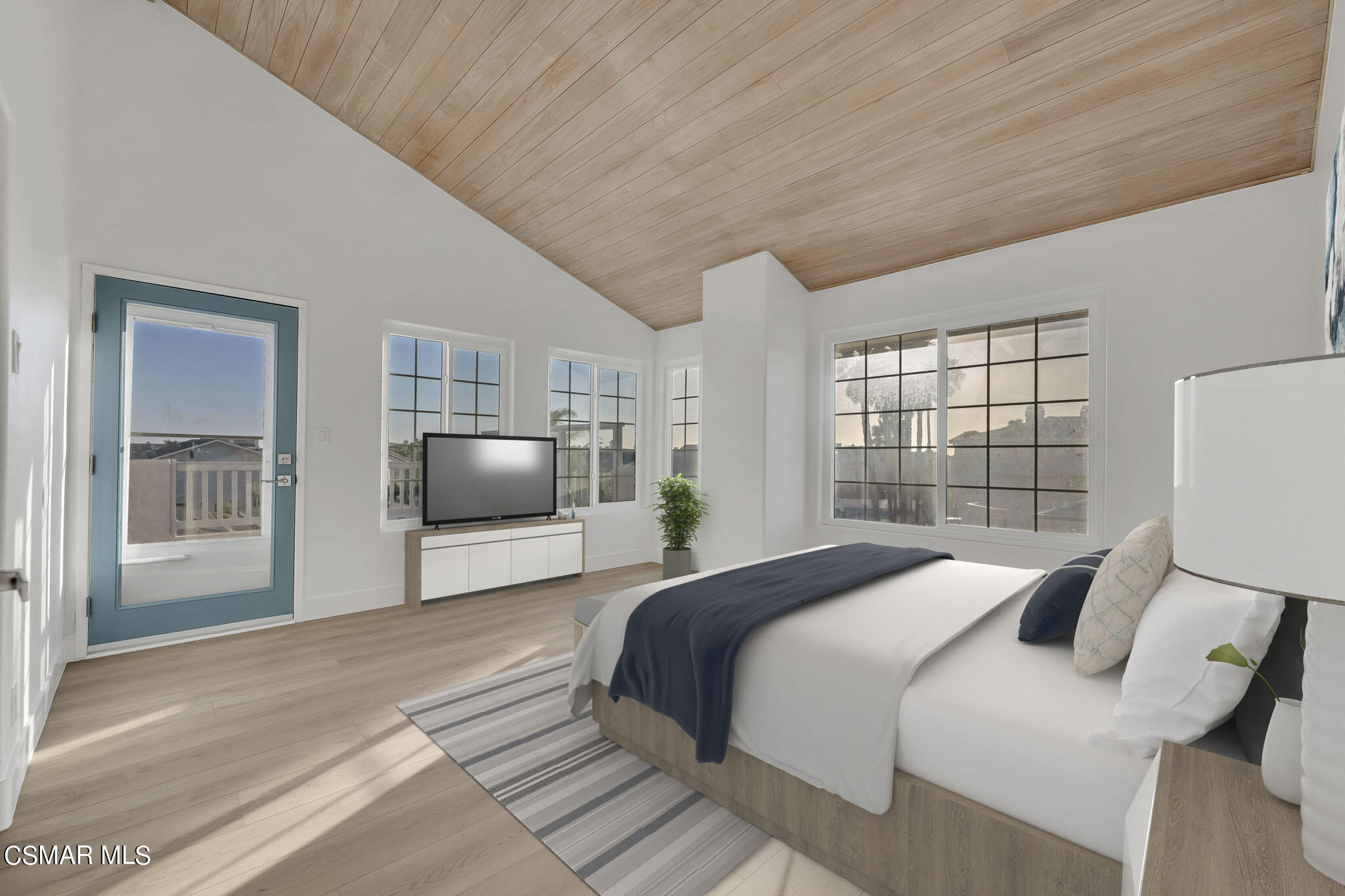 5222 West Wooley Road Oxnard, CA 93035 - Photo 22 of 39 a bedroom with a large bed and a window