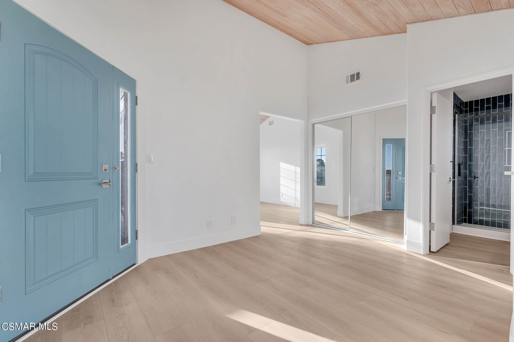 5222 West Wooley Road Oxnard, CA 93035 - Photo 26 of 39 a view of a livingroom with wooden floor and closet area