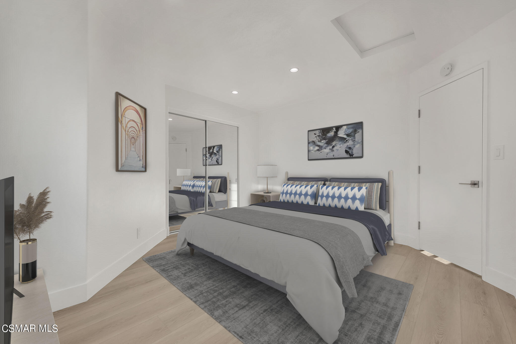 5222 West Wooley Road Oxnard, CA 93035 - Photo 28 of 39 a bedroom with a large bed and a couch