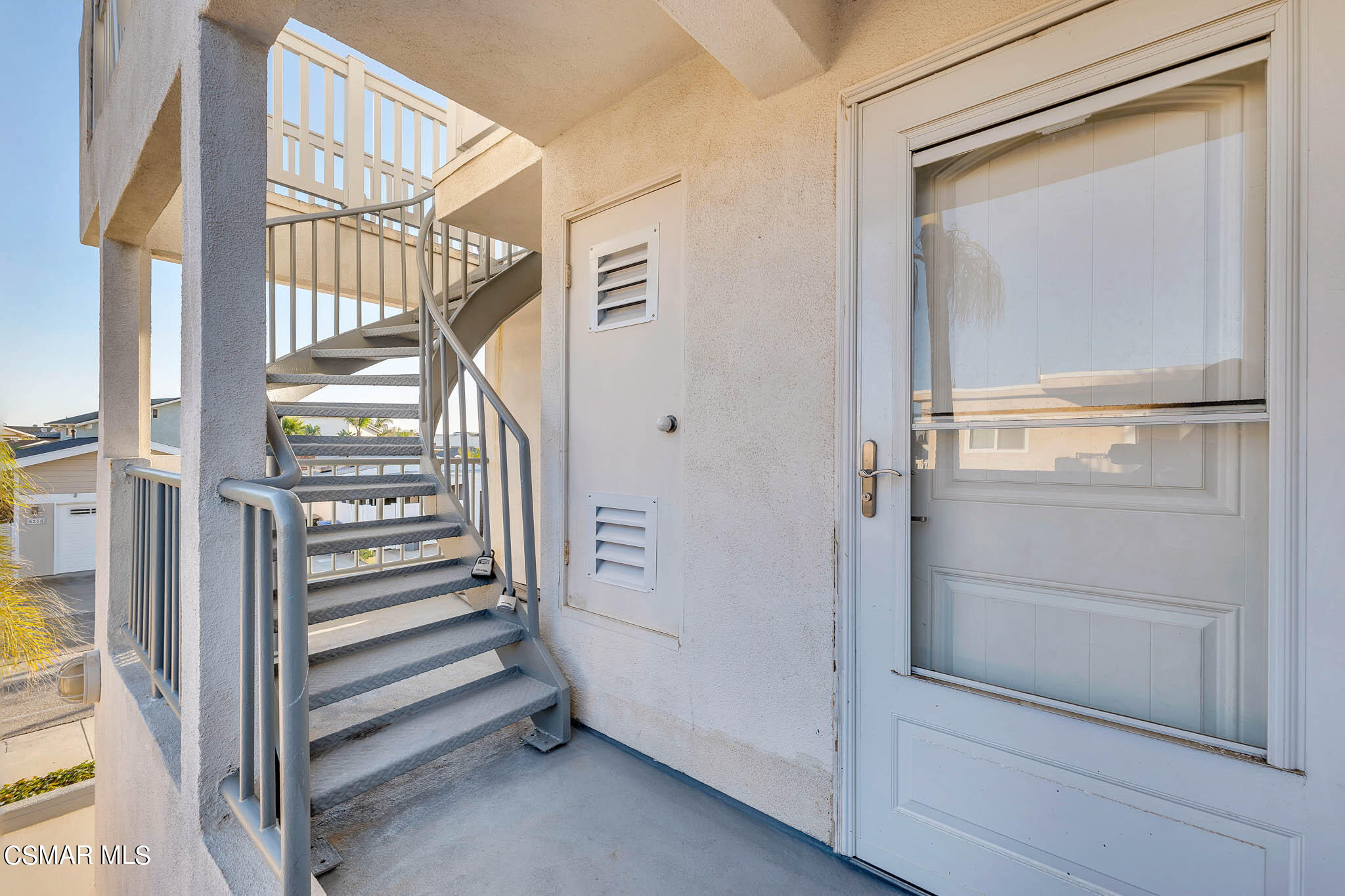 5222 West Wooley Road Oxnard, CA 93035 - Photo 32 of 39 a view of a hallway with staircase