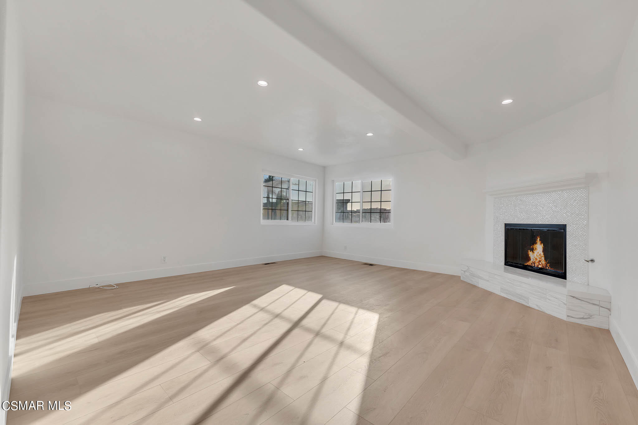 5222 West Wooley Road Oxnard, CA 93035 - Photo 9 of 39 an empty room with windows
