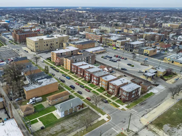 an aerial view of a city with lots of residential buildings