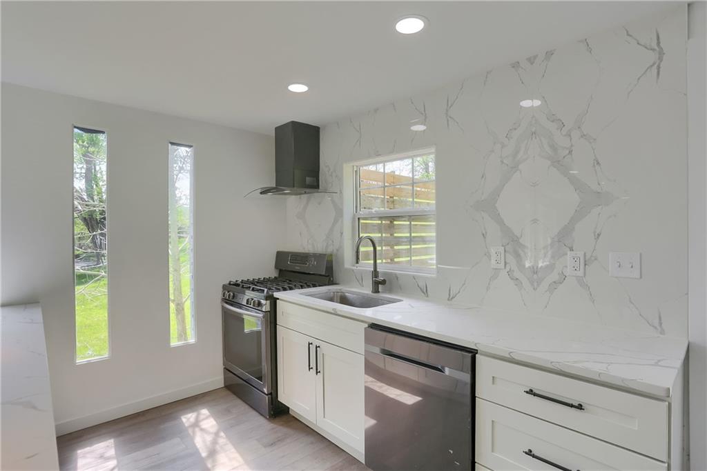 2513 Grove Road South Park, PA 15129 - Photo 13 of 50 a kitchen with a sink and a window