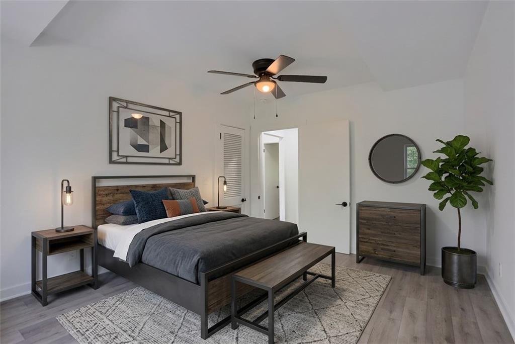 2513 Grove Road South Park, PA 15129 - Photo 21 of 50 a bedroom with bed and a chandelier