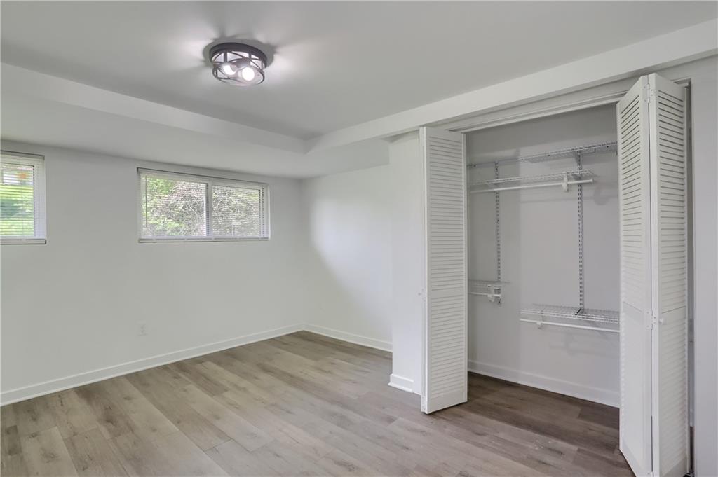 2513 Grove Road South Park, PA 15129 - Photo 25 of 50 wooden floor in an empty room with a window