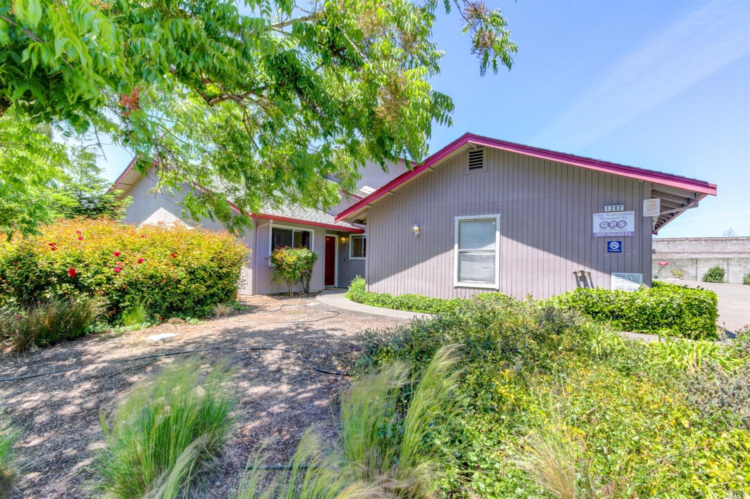1202 Capri Way Rohnert Park, CA 94928 - Photo 1 of 1 a front view of a house with a yard