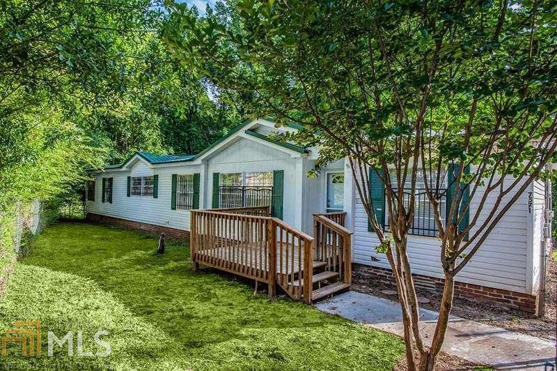 7571 Jefferson River Road Athens, GA 30607 - Photo 1 of 1 a view of a house with a yard and deck
