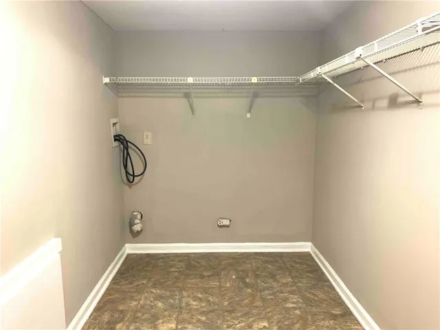 a view of a room with racks on the wall