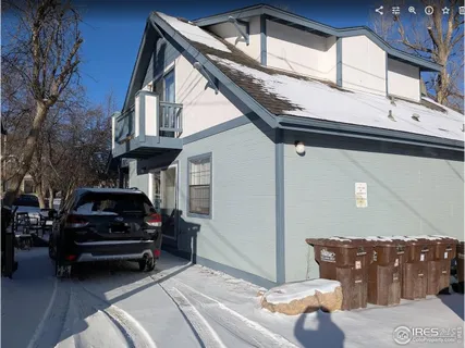 a car parked in front of a house