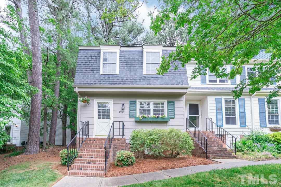 1318 Springlawn Court Raleigh, NC 27609 - Photo 1 of 30 front view of a house with a yard