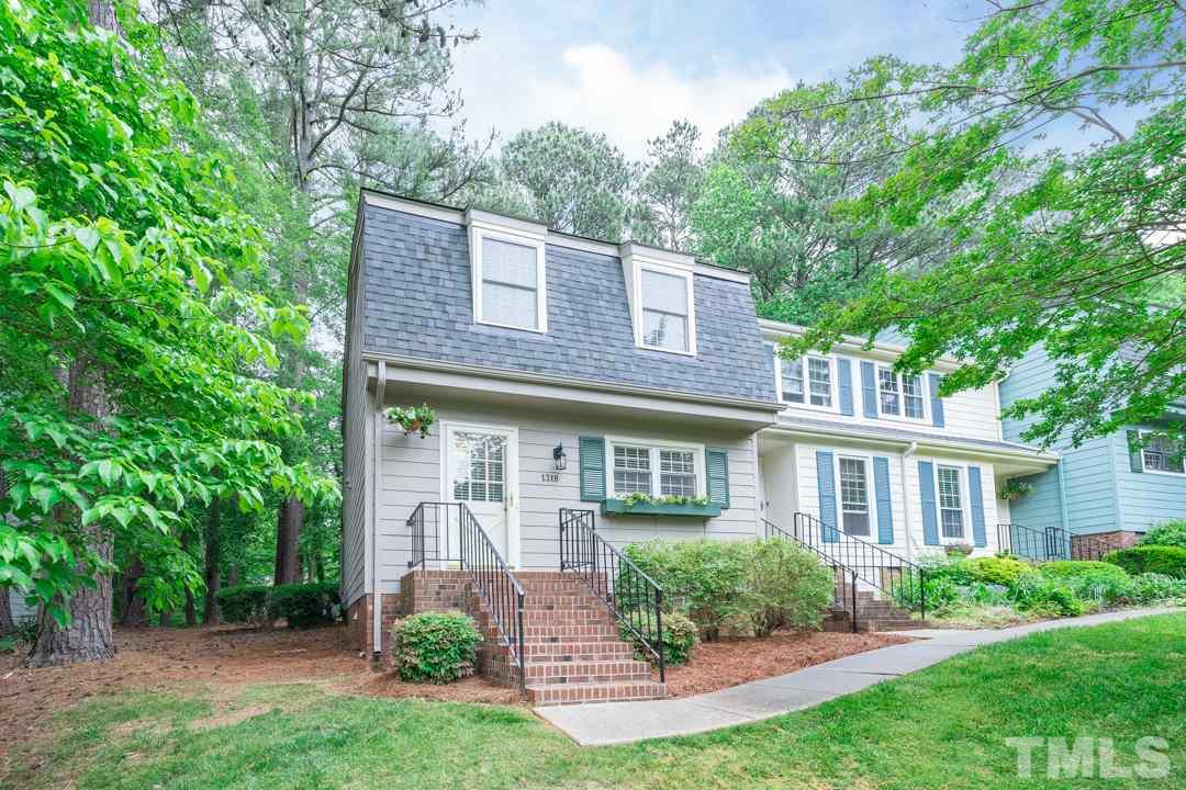 1318 Springlawn Court Raleigh, NC 27609 - Photo 2 of 30 front view of a house with a yard