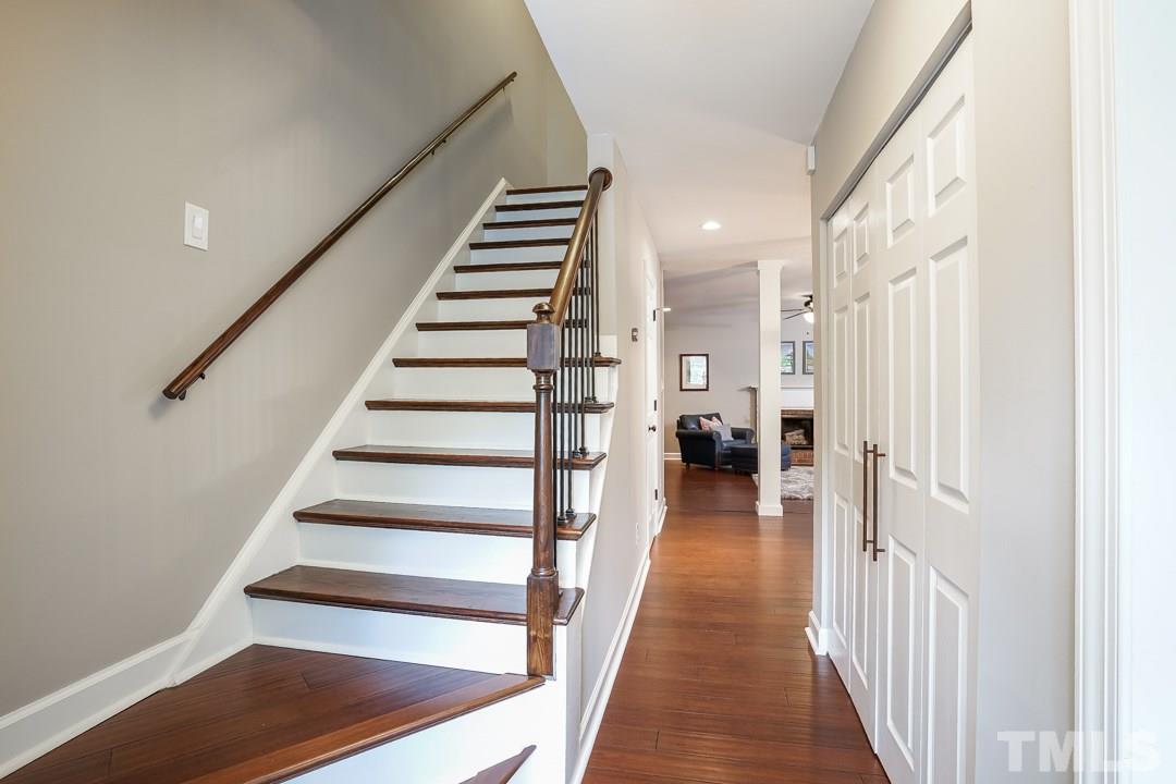 1318 Springlawn Court Raleigh, NC 27609 - Photo 13 of 30 a view of a hallway with wooden floor and entryway